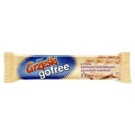 Batoniki - Grześki GOFREE WAFEL PRZEKŁADANY KREMEM O SMAKU WANILIOWO-CZEKOLADOWYM Z ORZECHAMI LASKOWYMI 33 G zakupy dla domu i biura! 67905000 - miniaturka - grafika 1
