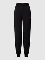 Spodnie sportowe damskie - Spodnie dresowe z nadrukiem z logo model ‘SHUFFLE’ - miniaturka - grafika 1