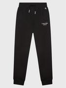 Spodnie i spodenki dla dziewczynek - Calvin Klein Jeans Spodnie dresowe Stack Logo IB0IB01282 Czarny Regular Fit - miniaturka - grafika 1
