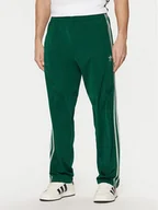 Spodnie sportowe męskie - adidas Spodnie dresowe adicolor Classics Firebird JP2539 Zielony Regular Fit - miniaturka - grafika 1