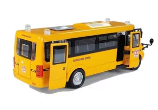 Metalowy Autobus Szkolny z silnikiem naciąganym - Samochody i pojazdy dla dzieci - miniaturka - grafika 4