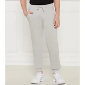 Spodnie i spodenki dla chłopców - Guess Spodnie dresowe | Regular Fit - miniaturka - grafika 1