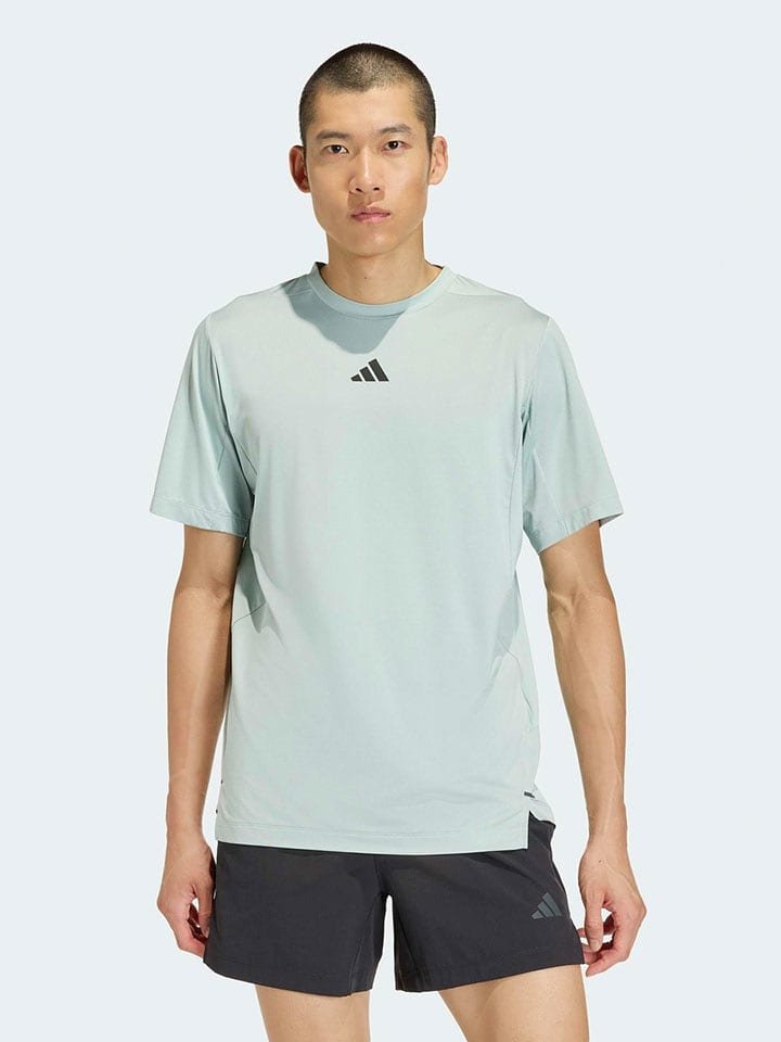 adidas Koszulka sportowa w kolorze błękitnym