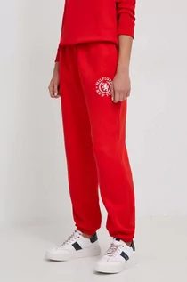 Spodnie damskie - Tommy Hilfiger spodnie dresowe kolor czerwony z aplikacją - grafika 1