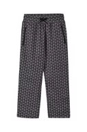 Spodnie i spodenki dla dziewczynek - Reima spodnie dresowe dziecięce kolor czarny wzorzyste - miniaturka - grafika 1