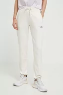 Spodnie damskie - The North Face spodnie dresowe bawełniane kolor beżowy z nadrukiem NF0A87DMQLI1 - miniaturka - grafika 1