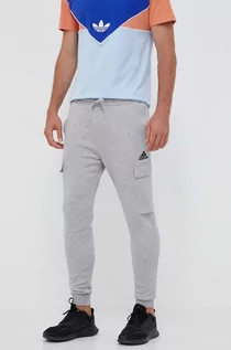 Spodnie męskie - adidas spodnie dresowe kolor szary melanżowe - grafika 1