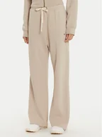 Spodnie sportowe damskie - Champion Spodnie dresowe 117638 Beżowy Wide Leg - miniaturka - grafika 1