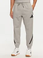 Spodnie sportowe męskie - adidas Spodnie dresowe Z.N.E. JF2446 Szary Regular Fit - miniaturka - grafika 1
