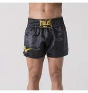 Kimona, stroje i obuwie - Everlast Spodenki Muay Thai Black/Gold Rozmiar Xl - miniaturka - grafika 1