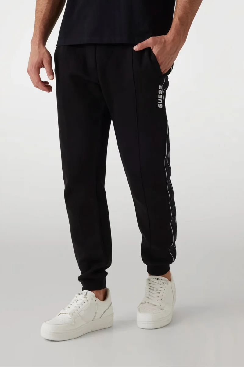 GUESS Czarne męskie spodnie dresowe z lampasami Mickey XXL