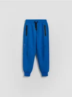 Spodnie i spodenki dla chłopców - Reserved - Dzianinowe joggery - niebieski - miniaturka - grafika 1