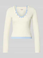 Bluzki damskie - Bluzka o kroju slim fit z długim rękawem i fakturowanym wzorem - miniaturka - grafika 1