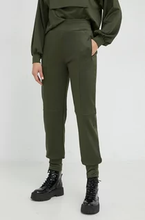 Spodnie damskie - Guess spodnie dresowe damskie kolor zielony gładkie - grafika 1