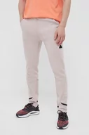 Spodnie męskie - adidas spodnie dresowe kolor różowy z aplikacją - miniaturka - grafika 1