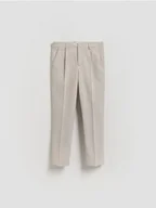 Spodnie i spodenki dla chłopców - Reserved - Eleganckie spodnie - beżowy - miniaturka - grafika 1