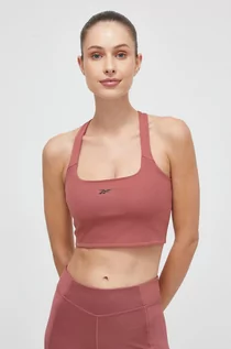 Koszulki sportowe damskie - Reebok top do jogi kolor różowy - grafika 1