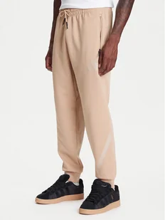 adidas Spodnie dresowe Z.N.E. JW4725 Beżowy Loose Fit - Spodnie sportowe męskie - miniaturka - grafika 1
