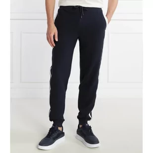 Tommy Hilfiger Spodnie dresowe | Regular Fit - Dresy męskie - miniaturka - grafika 1