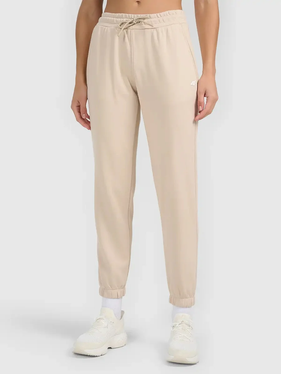 Spodnie dresowe typu jogger damskie 4F 4FWAW26TTROF1754-83S Brązowy M