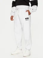 Spodnie sportowe męskie - Champion Spodnie dresowe 220434 Szary Loose Fit - miniaturka - grafika 1