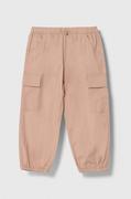 Spodnie i spodenki dla dziewczynek - United Colors of Benetton spodnie dziecięce kolor różowy gładkie - miniaturka - grafika 1