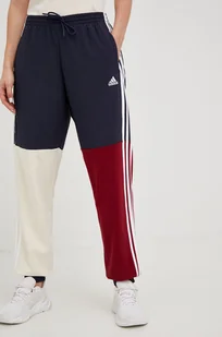 adidas spodnie dresowe Essentials damskie kolor granatowy wzorzyste - Spodnie damskie - miniaturka - grafika 1