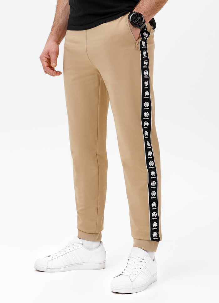 Spodnie sportowe PIT BULL Tricot Terry TAPE NUGGET beżowe (pale sand)-L