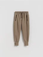 Spodnie i spodenki dla chłopców - Reserved - Bawełniane spodnie - brązowy - miniaturka - grafika 1