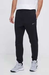 Spodnie męskie - Reebok spodnie dresowe kolor czarny gładkie - grafika 1