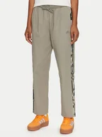 Spodnie sportowe damskie - adidas Spodnie dresowe Essentials Camo-Print 3-Stripes IY1686 Zielony Loose Fit - miniaturka - grafika 1