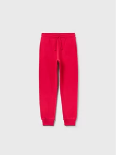 Spodnie i spodenki dla dziewczynek - OVS Spodnie dresowe 1593222 Różowy Regular Fit - grafika 1
