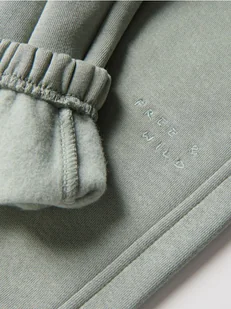 Reserved - Ocieplane spodnie jogger - jasnozielony - Spodenki dla niemowląt - miniaturka - grafika 1