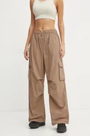 Spodnie damskie - New Balance spodnie damskie kolor zielony szerokie high waist WP43534LMR - miniaturka - grafika 1