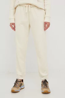 Spodnie damskie - Outhorn spodnie dresowe damskie kolor beżowy gładkie - grafika 1