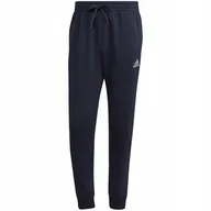 Dresy męskie - Spodnie męskie adidas Essentials Fleece Regular Tapered granatowe HL2231 S - miniaturka - grafika 1