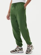 Spodnie sportowe męskie - New Balance Spodnie dresowe MP41508 Zielony Relaxed Fit - miniaturka - grafika 1