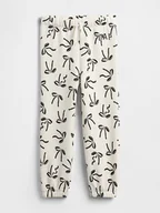 Spodenki dla niemowląt - GAP Spodnie dresowe w kolorze kremowym - miniaturka - grafika 1