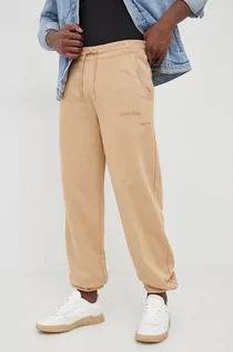 Spodnie damskie - Calvin Klein Jeans Jeans spodnie kolor beżowy gładkie - grafika 1