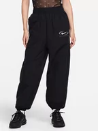 Spodnie sportowe damskie - Nike Spodnie dresowe w kolorze czarnym - miniaturka - grafika 1