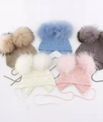 Czapki dla dzieci - Czapka dziecięca z pomponami naturalnymi 6-12m - miniaturka - grafika 1
