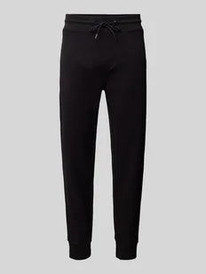 Spodnie dresowe o kroju slim fit z fakturowanym wzorem model ‘Lamont’ - Spodnie sportowe męskie - miniaturka - grafika 1