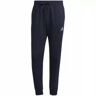 Dresy męskie - Spodnie męskie adidas Essentials Fleece Regular Tapered granatowe HL2231 S - miniaturka - grafika 1