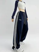 Spodnie sportowe damskie - Szerokie dresy damskie z paskami - Granatowy - miniaturka - grafika 1