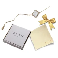 Bransoletki - Delikatna damska złota bransoletka biała koniczynka - miniaturka - grafika 1