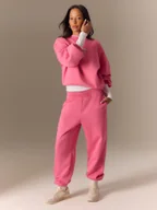 Spodnie sportowe damskie - 4F Spodnie dresowe joggery damskie - różowe XS - miniaturka - grafika 1