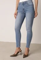 Spodnie damskie - Niebieskie Dopasowane Jeansy z Bawełną z Efektem Push-Up Eriflare - miniaturka - grafika 1