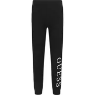 Spodnie sportowe damskie - Guess Legginsy | Slim Fit - miniaturka - grafika 1