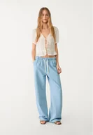 Spodnie damskie - Stradivarius Luźne jeansy Jasnoniebieski XS - miniaturka - grafika 1