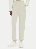 Spodnie sportowe damskie - Calvin Klein Jeans Spodnie dresowe J20J224443 Beżowy Regular Fit - miniaturka - grafika 1